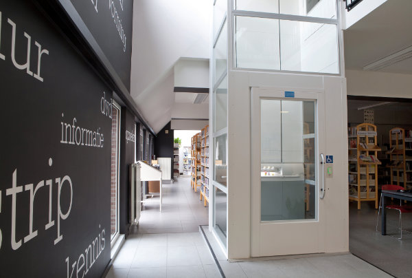 Commercial Platform Lift in white in a library