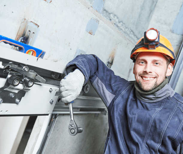 man with orange safety helmet and tools