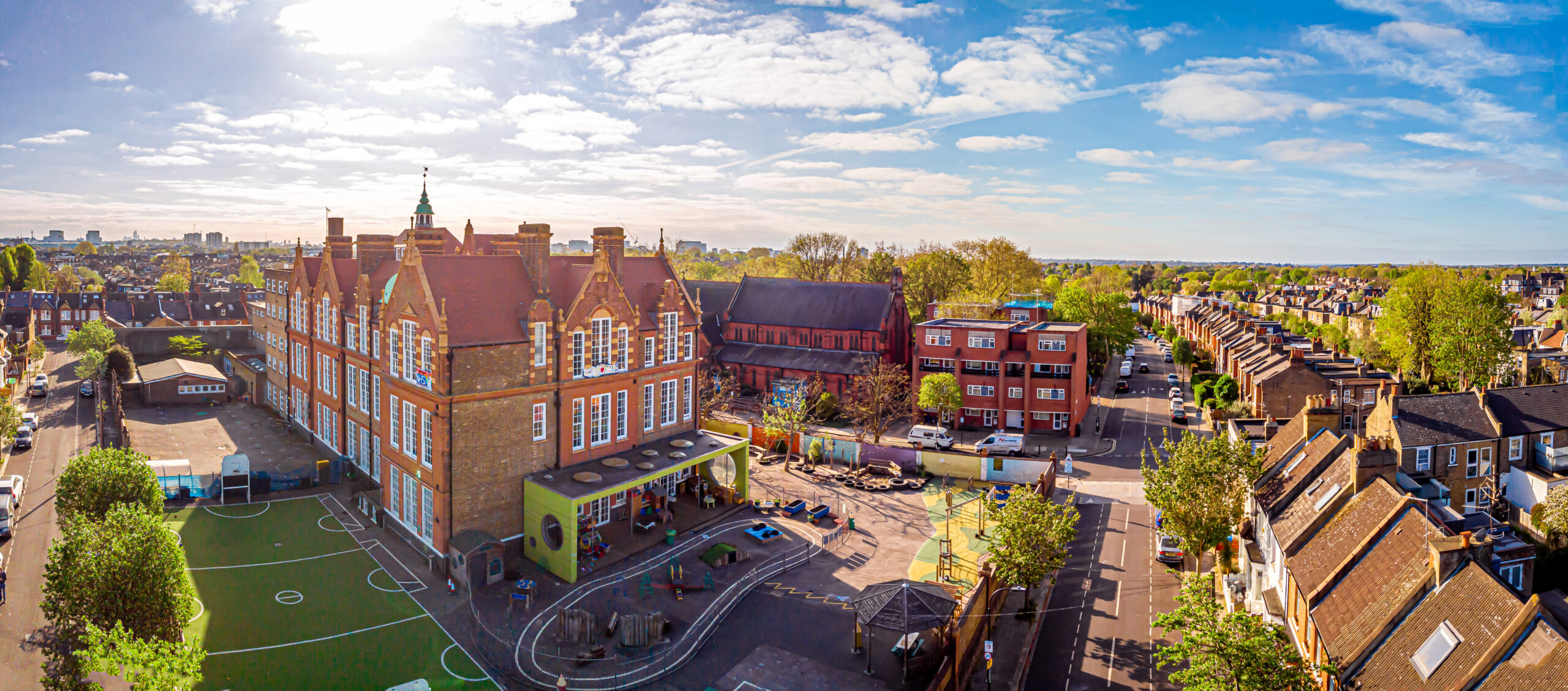 Aerial view of school in London suburb in the morning, UK